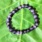 Amethyst Bracelet Resting on Sacred Fig Leaf