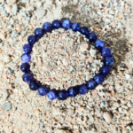 Amethyst Bracelet Resting on Sand