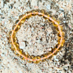 Citrine Bracelet Resting on Sand