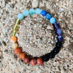 Seven Chakra Bracelet Resting on Sand